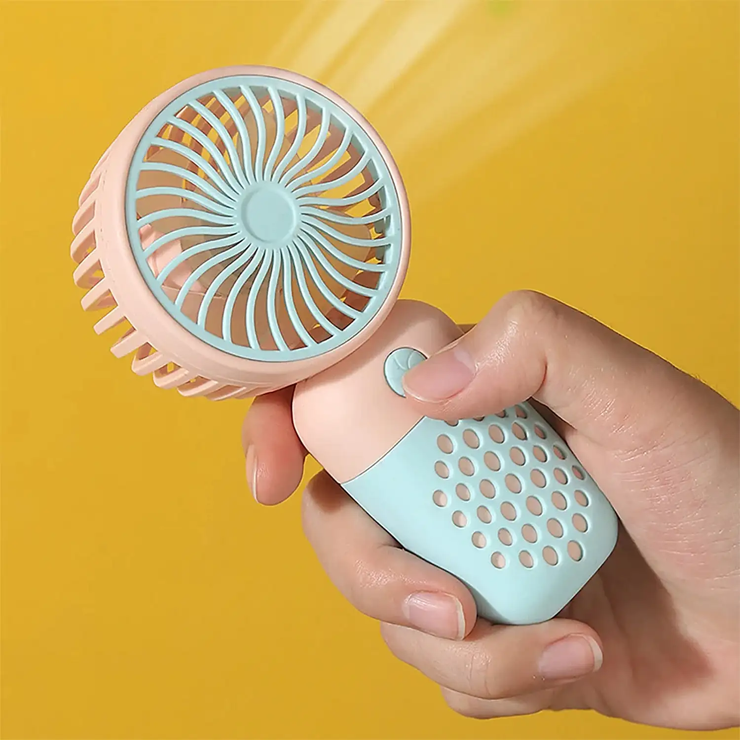 Mini ventilador de mano.