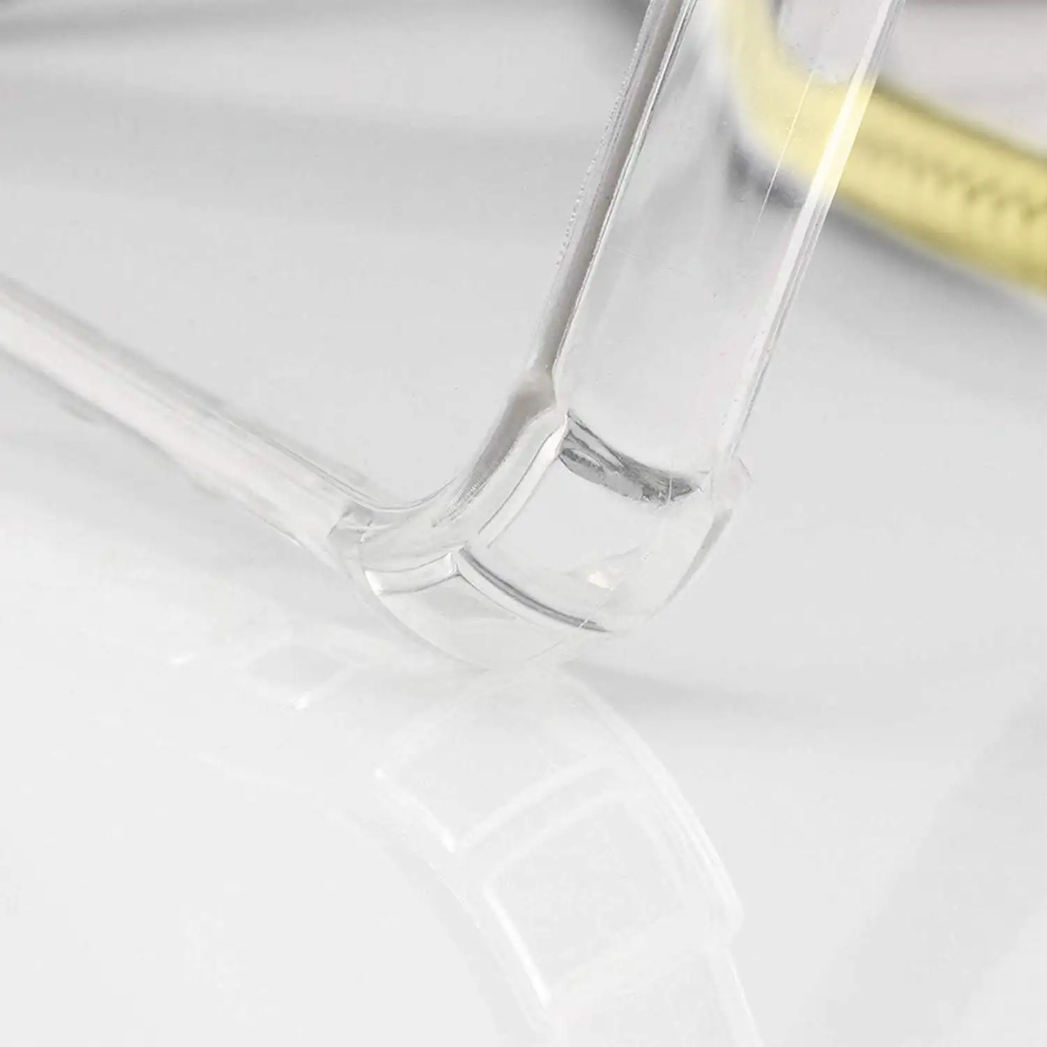 Carcasa transparente iPhone X con colgante de nylon. Accesorio de moda, ajuste perfecto y máxima protección