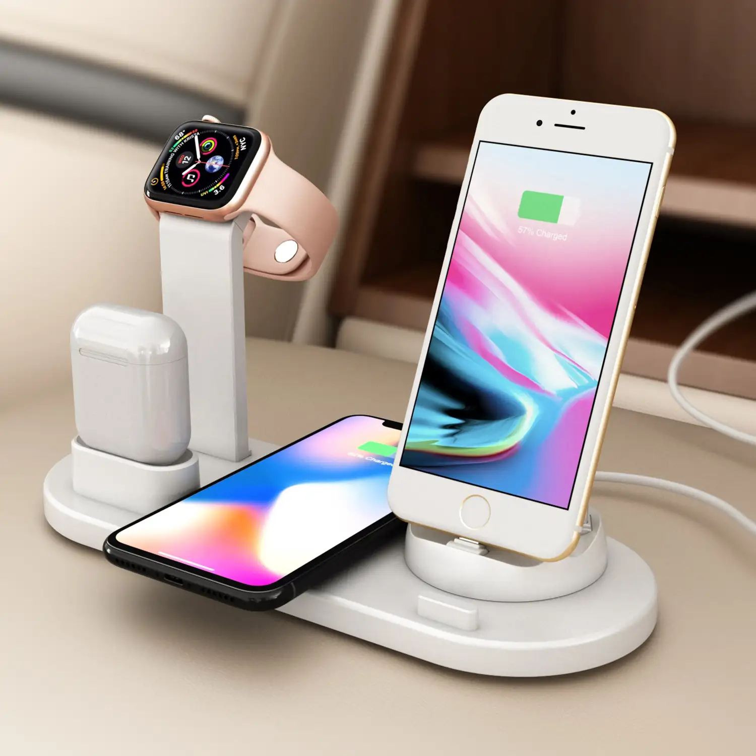 Base de carga 4 en 1 con carga inalámbrica QI, soporte giratorio con conexión lightning, micro USB y USB-C. Stand para Apple Watch y soporte con carga para Airpods. Cable extraíble.