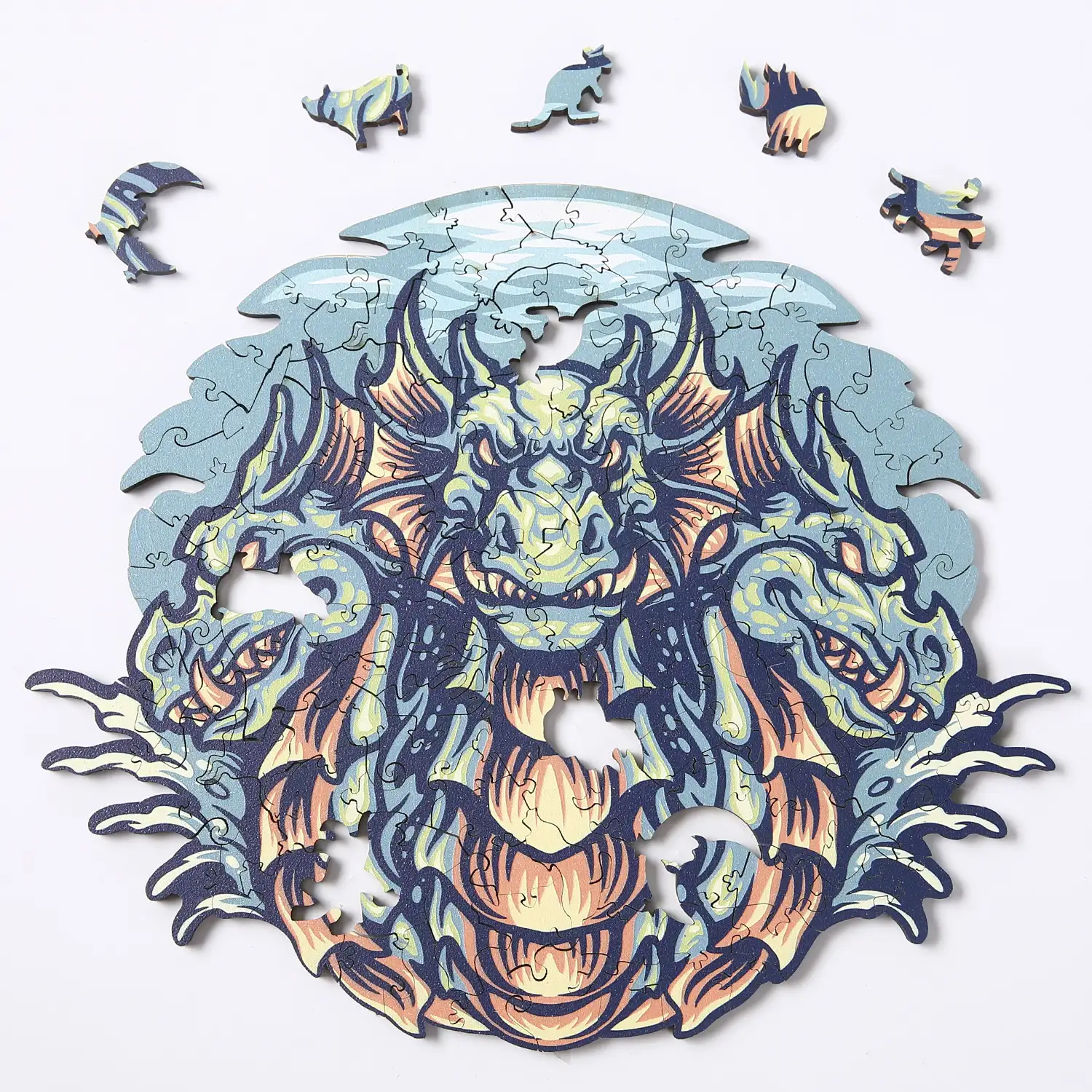 Puzzle de madera DIY forma de silueta . Con piezas individuales con diferentes diseños. En madera policromada. Tamaño A4.DISEÑO DRAGÓN.