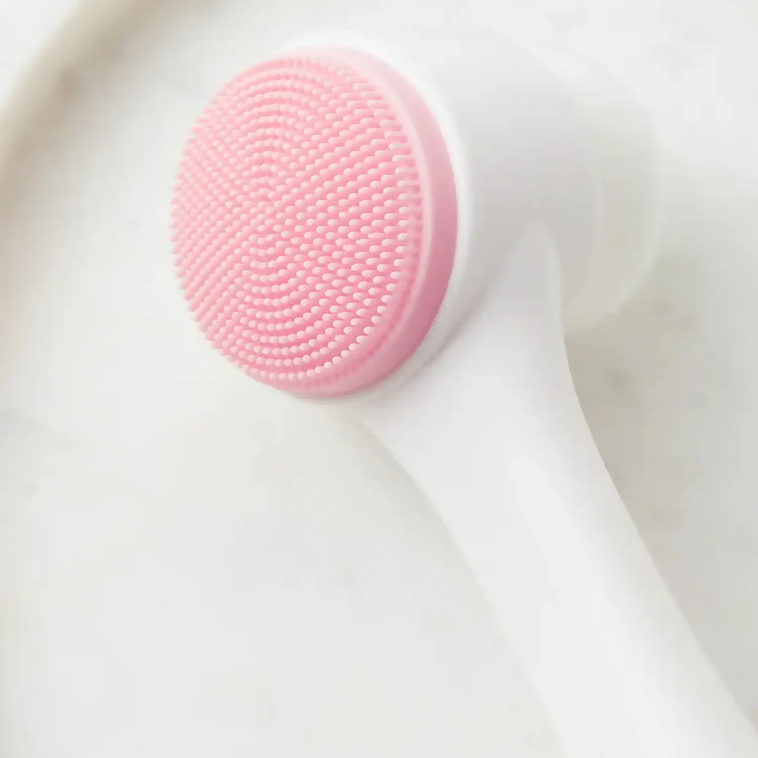 Cepillo facial de silicona multifunción de doble cara para masaje y limpieza profunda.