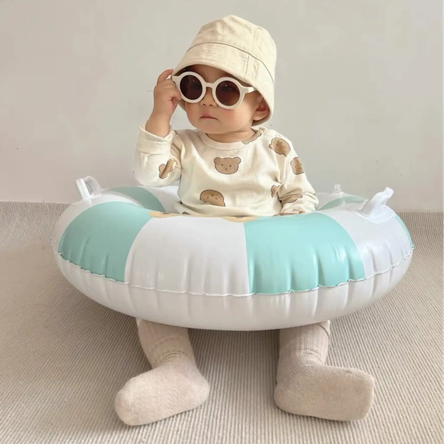Flotador infantil redondo con asas, 60 cm.