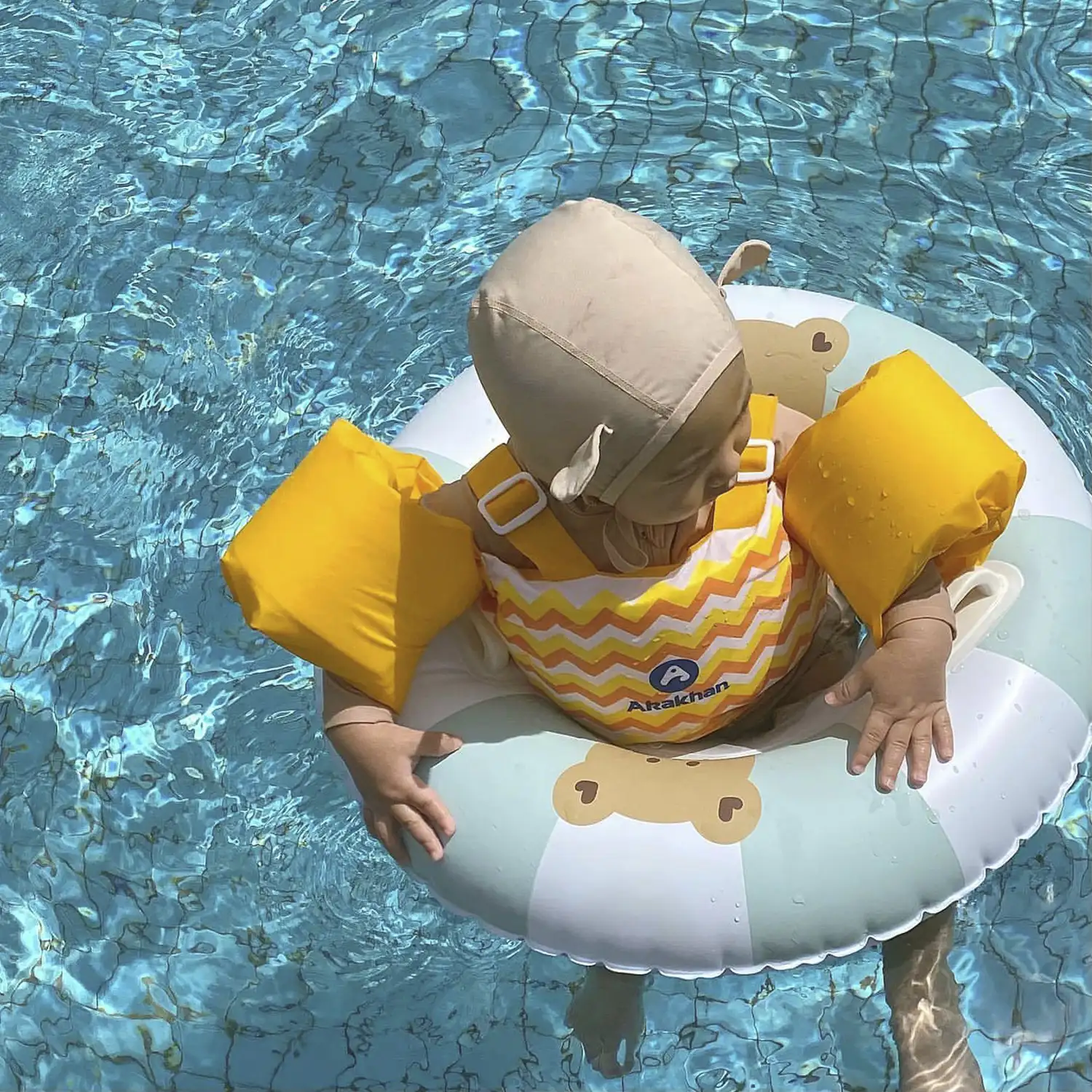 Flotador infantil redondo con asas, 60 cm.