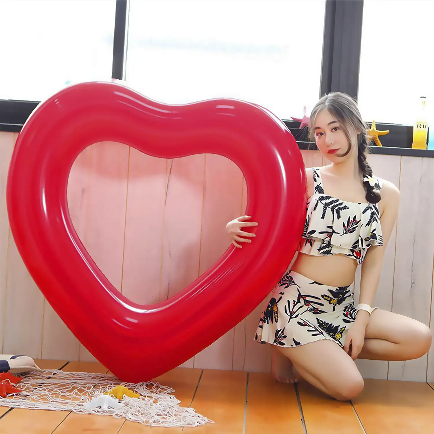 Flotador de 120cm con forma de corazón.