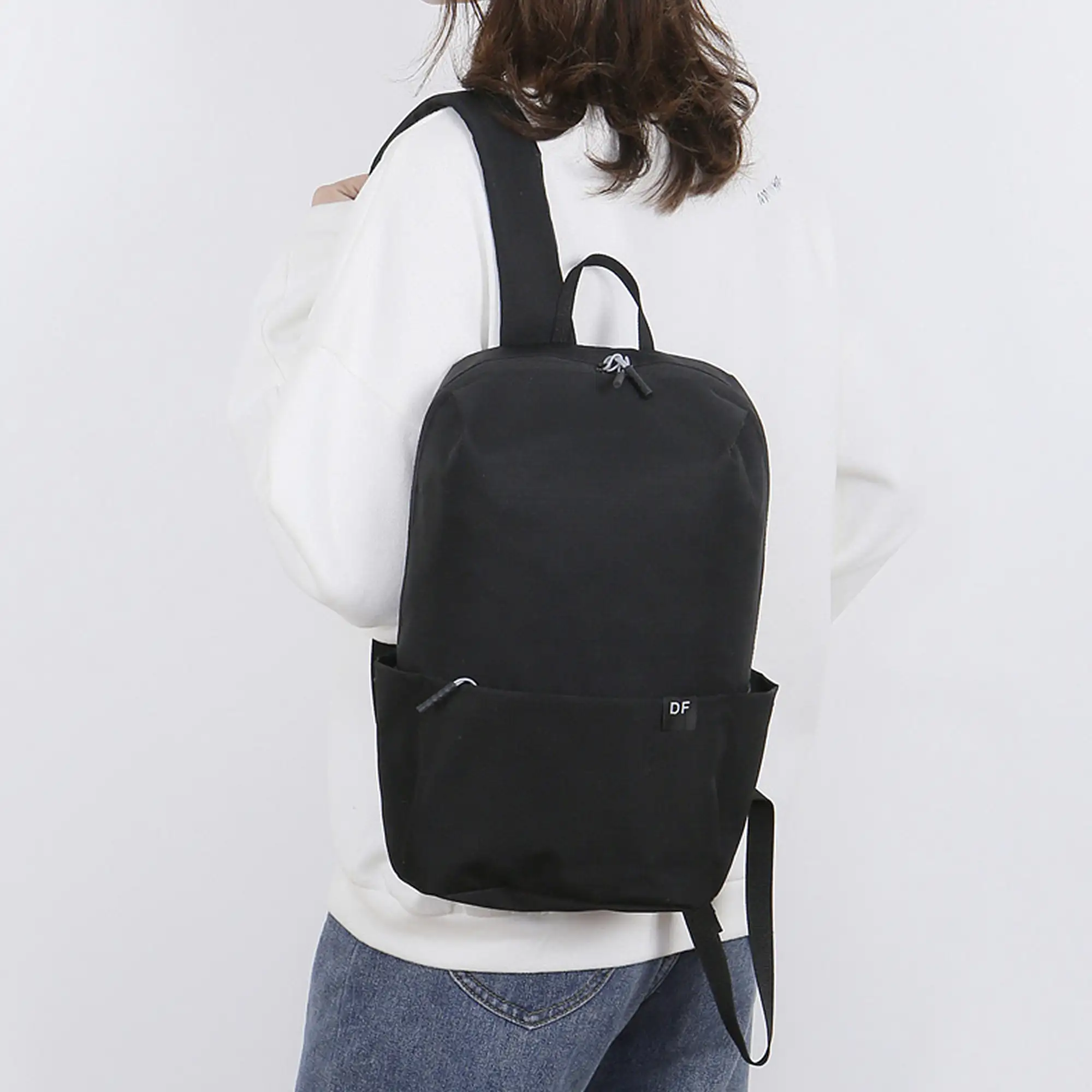 Mini mochila impermeable.
