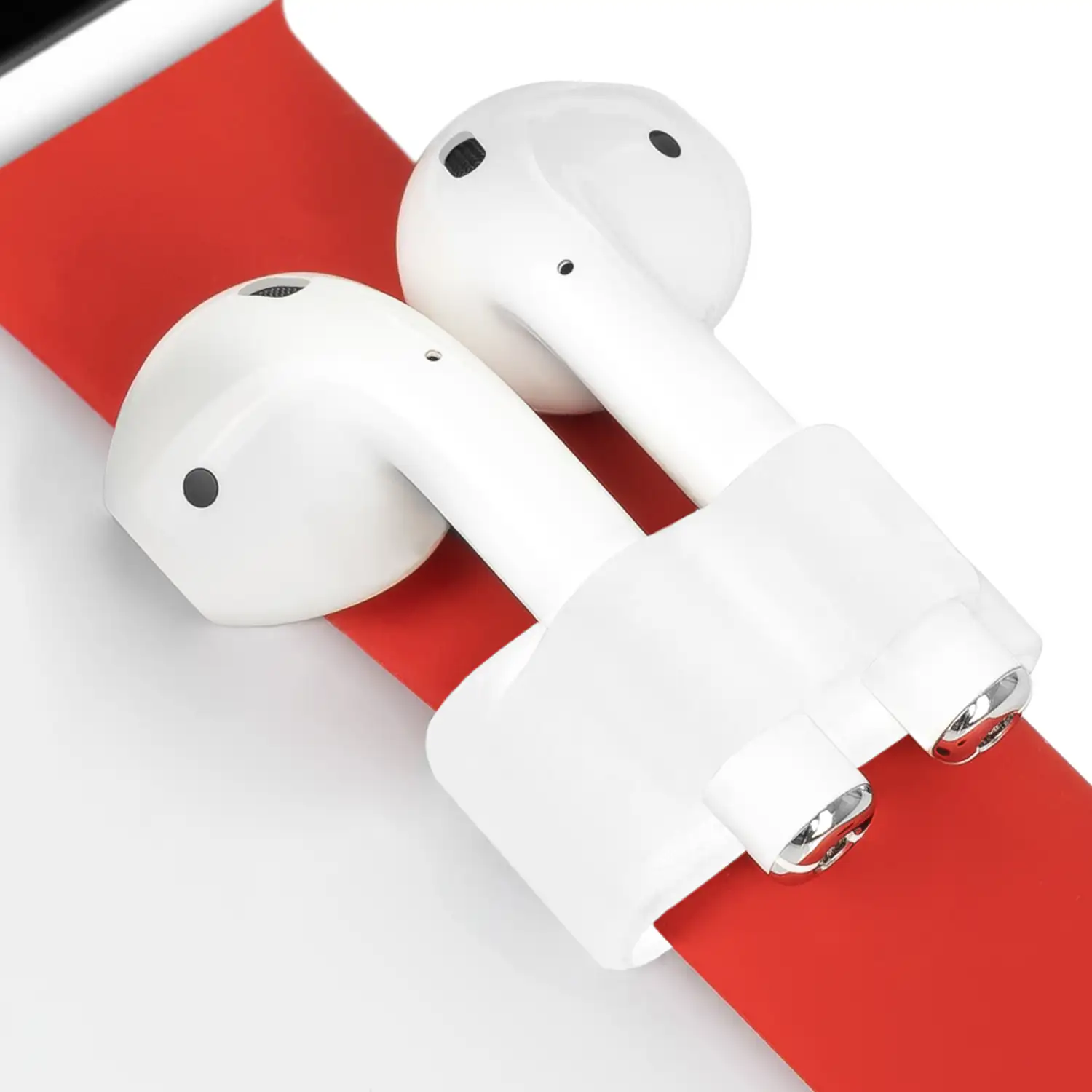 Pack de accesorios para Airpods, con funda semirrígida, carcasa para base de carga, mosquetón, almohadillas, correa y enganche para el reloj.