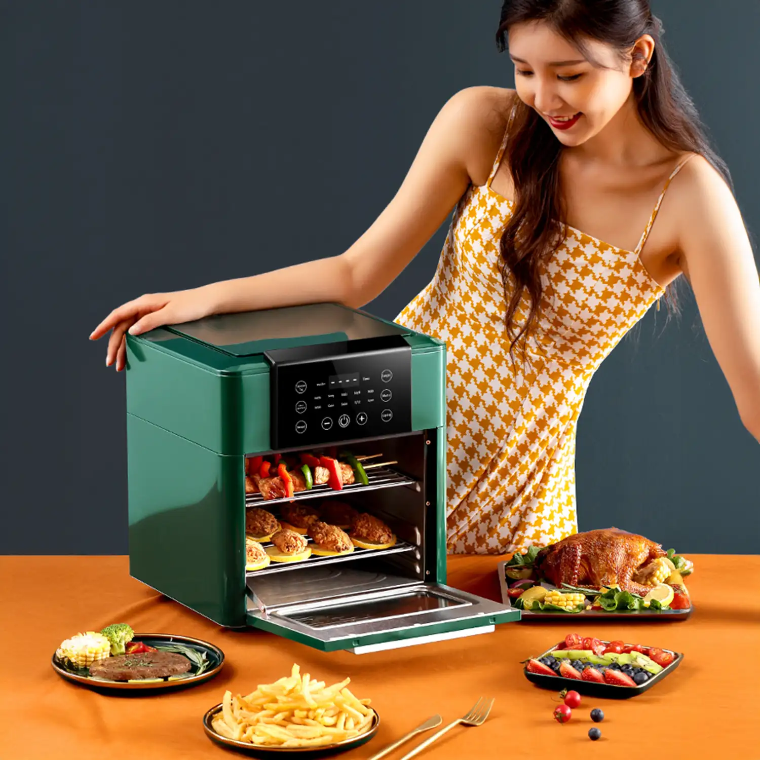 Freidora de aire multifunción con 1350W, 12L de capacidad. Pantalla LCD con panel de control táctil y 9 programas de cocina pregrabados.