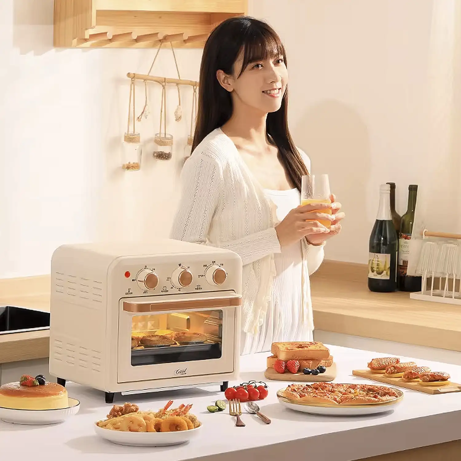 Horno freidora de aire con 15 litros de capacidad. Panel de control mecánico y 1300W de potencia.