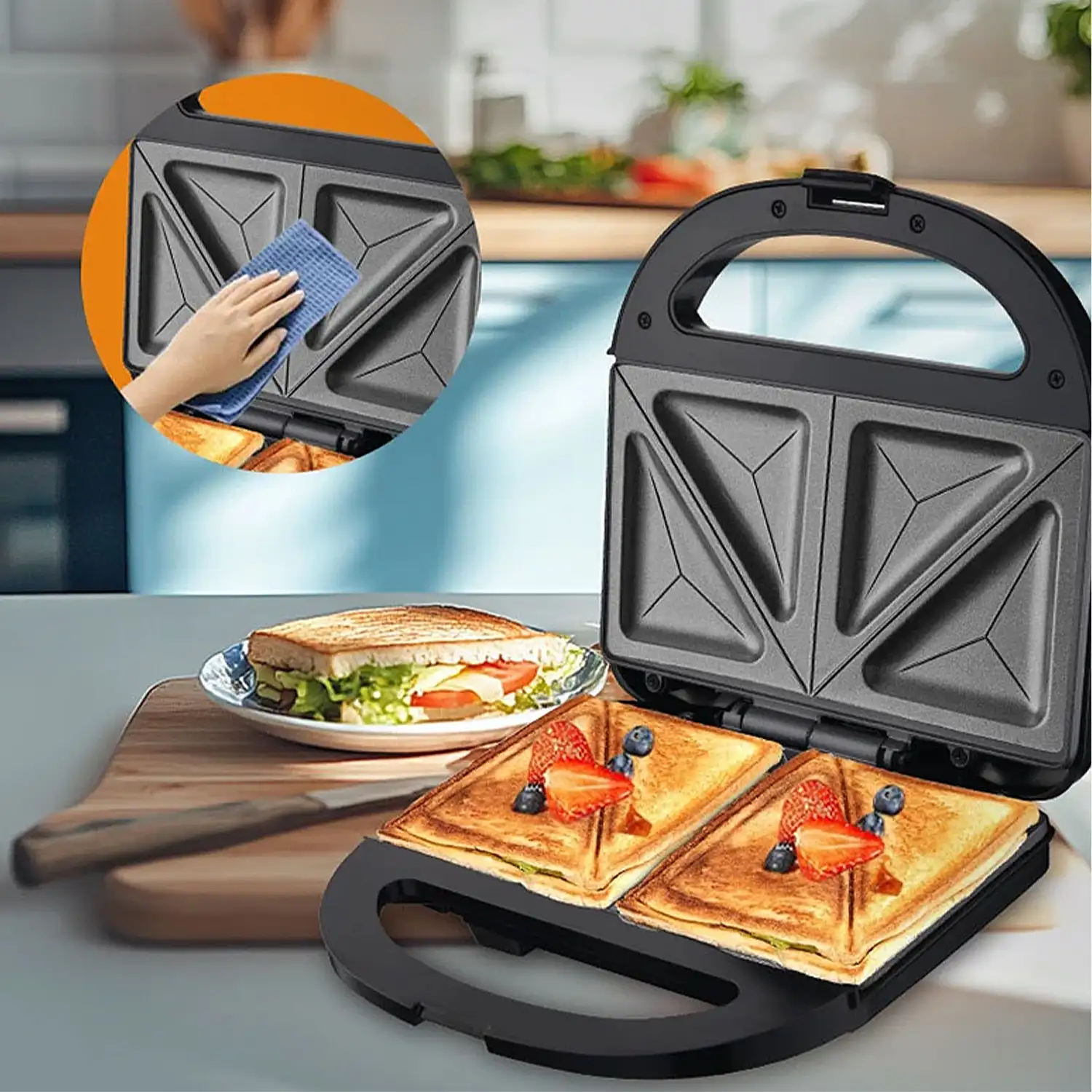 Sandwichera antiadherente con 750W de potencia y luz indicadora. Placas triangulares especiales sandwich.