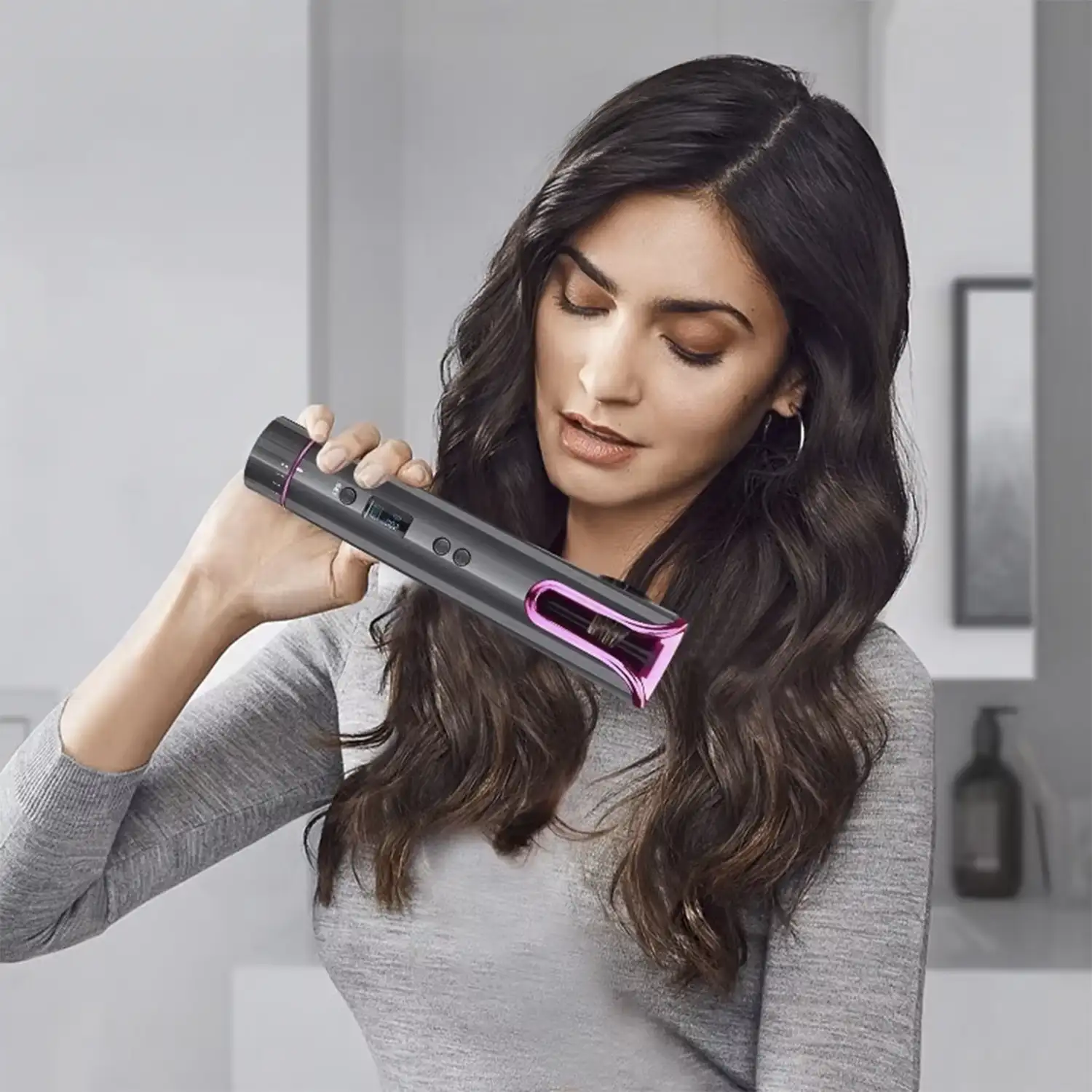 Rizador de pelo con giro automático, 4 niveles de temperatura y 6 ajustes de temporización.