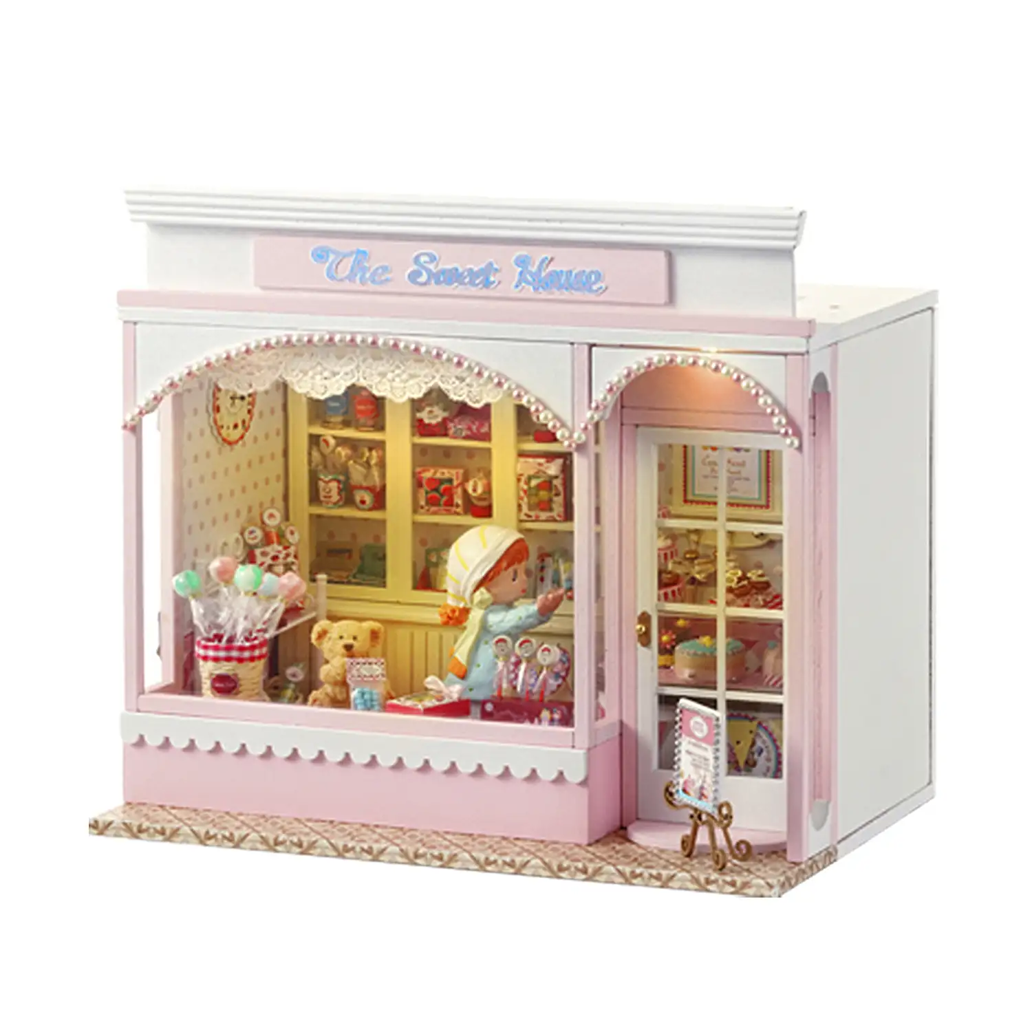 Tienda de dulces. Maqueta 3D con diseño de panel de puerta abierta, realista con gran detalle y luces led.